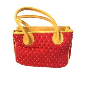 J. McLaughlin red fabric quilted purse tan leather handles and lining. handbag